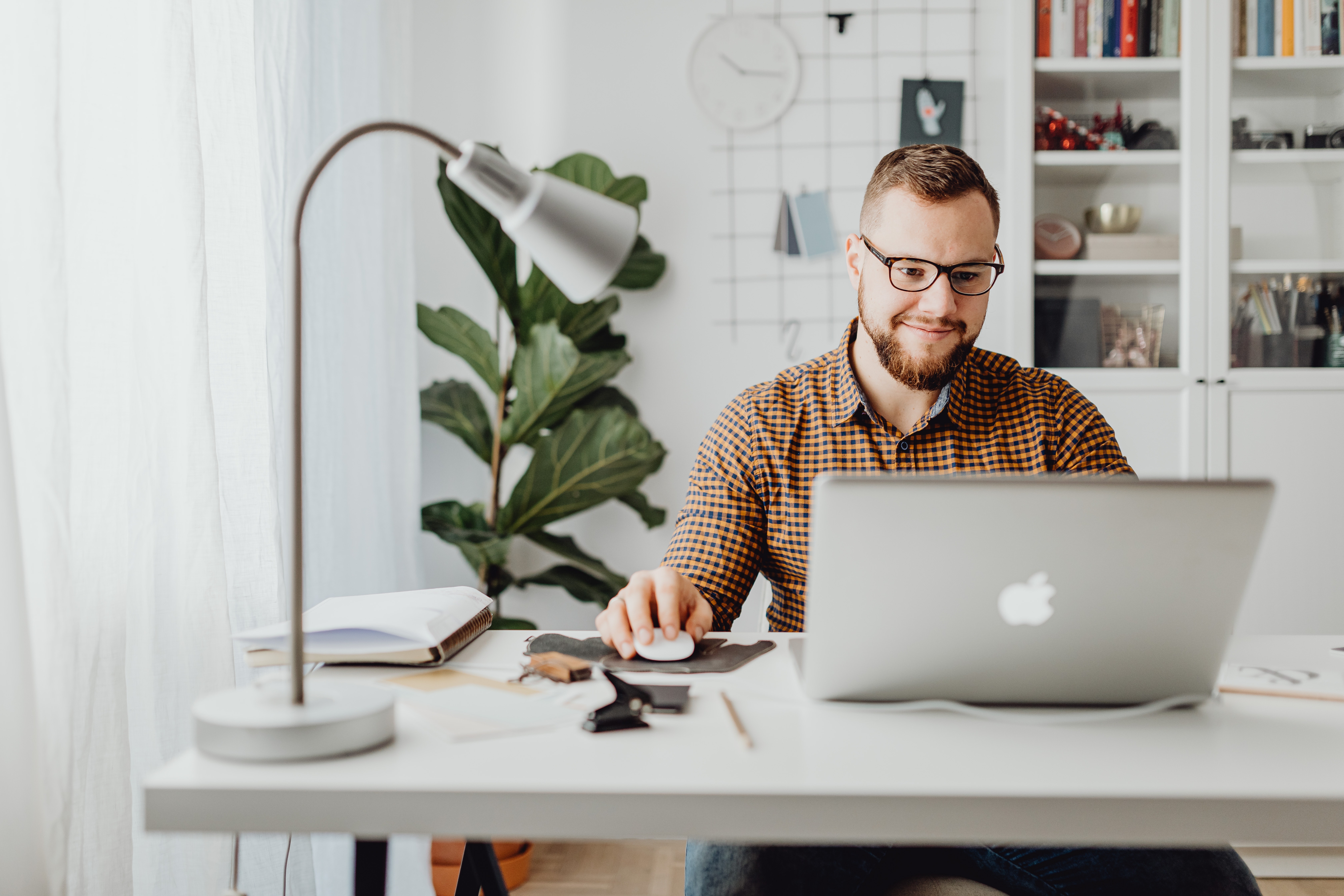 Adult man remote working on computer 